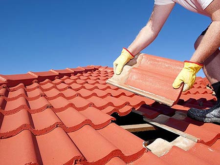 Woolton Roofing Specialists replacing roof tiles